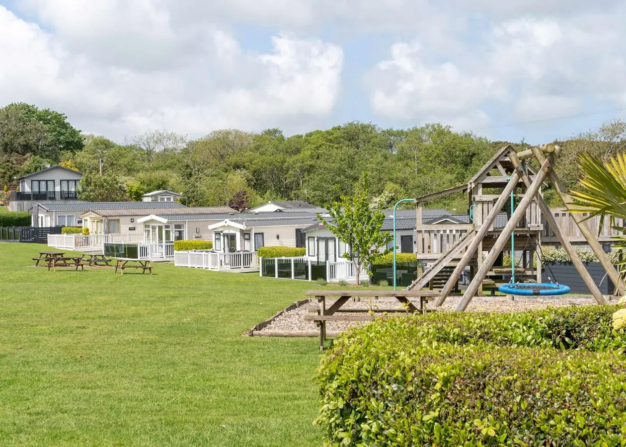crugan caravans in field with park